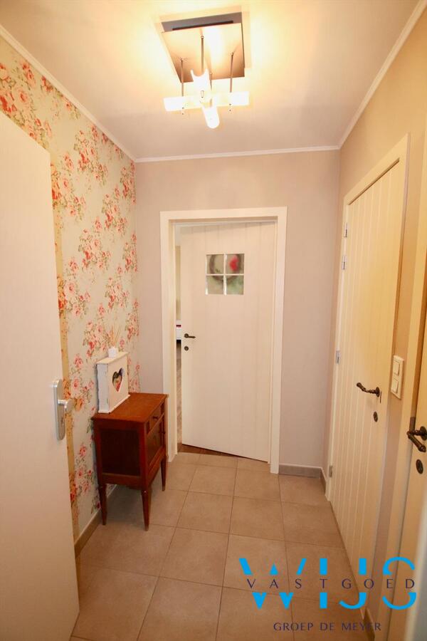 Charmant instapklaar tweeslaapkamer appartement in centrum Ertvelde! 