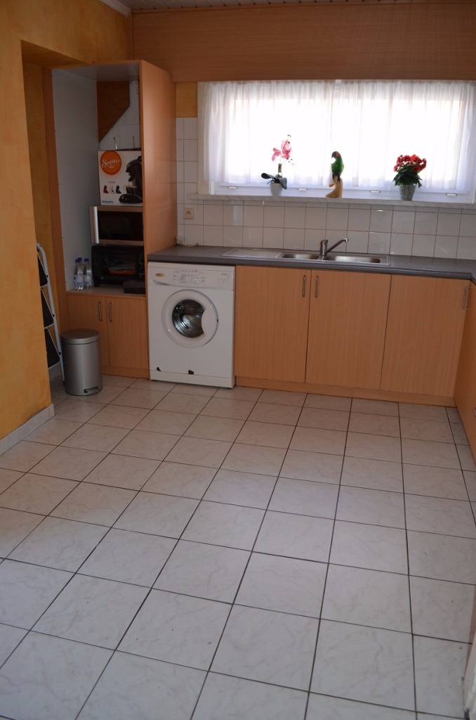 Te renoveren woning met garage nabij centrum Maldegem 