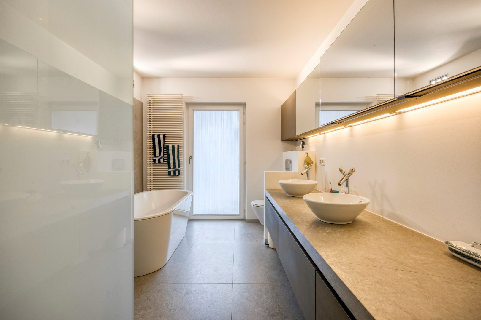 Gelijkvloers appartement met een terras van 50m²,  3 slaapkamers en staanplaats in het centrum van Leuven! - bewoonbare opp. 147m² 