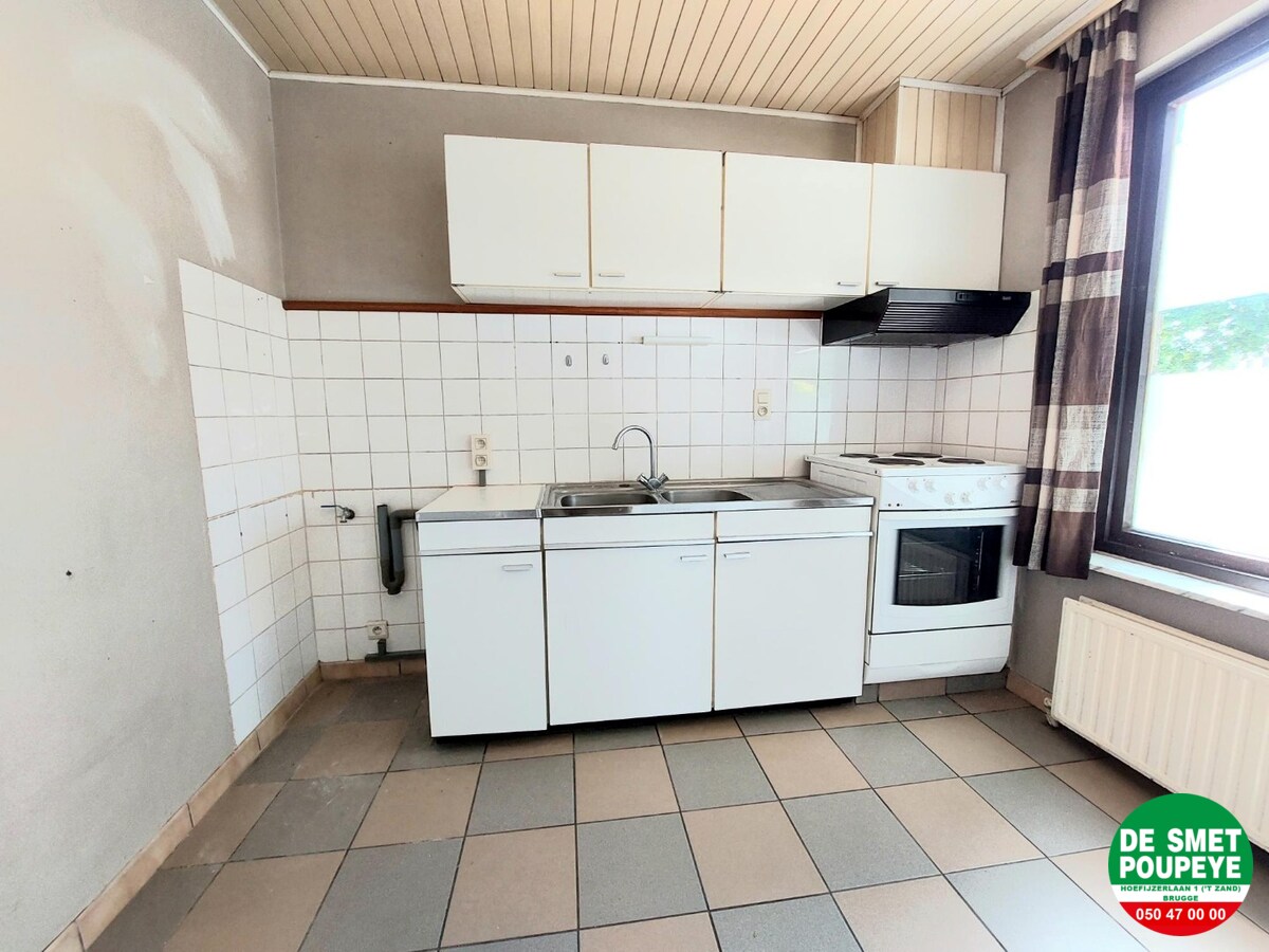 GELIJKVLOERSAPPARTEMENT MET TUINTJE 