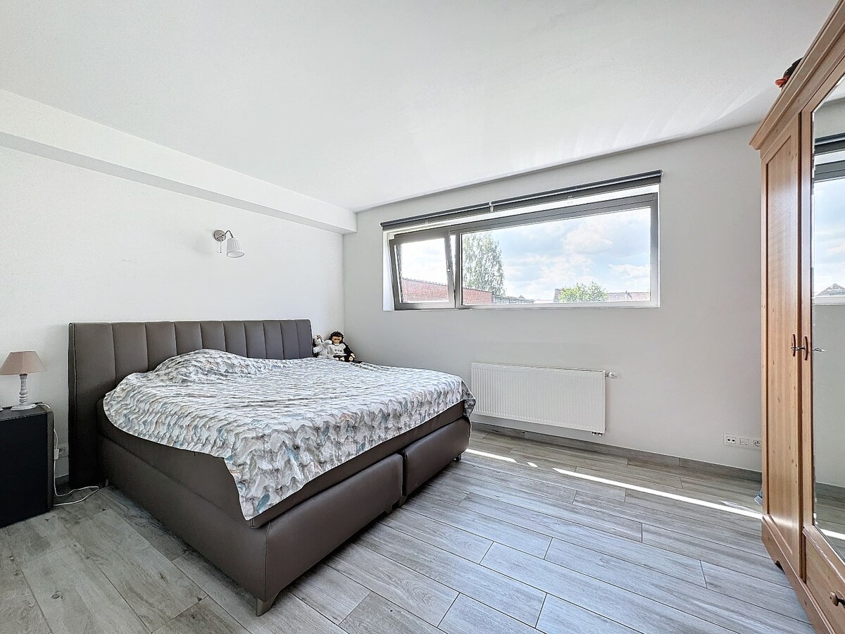 Recent (2017) gelijkvloers appartement met grote tuin te Ophasselt 