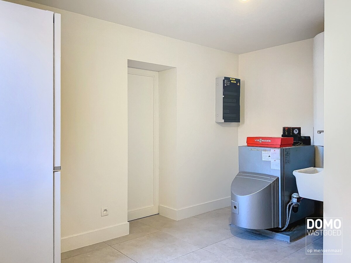 Ruime, energetisch gerenoveerde woning met open leefruimte, 4 slaapkamers en 2 badkamers te Kermt 