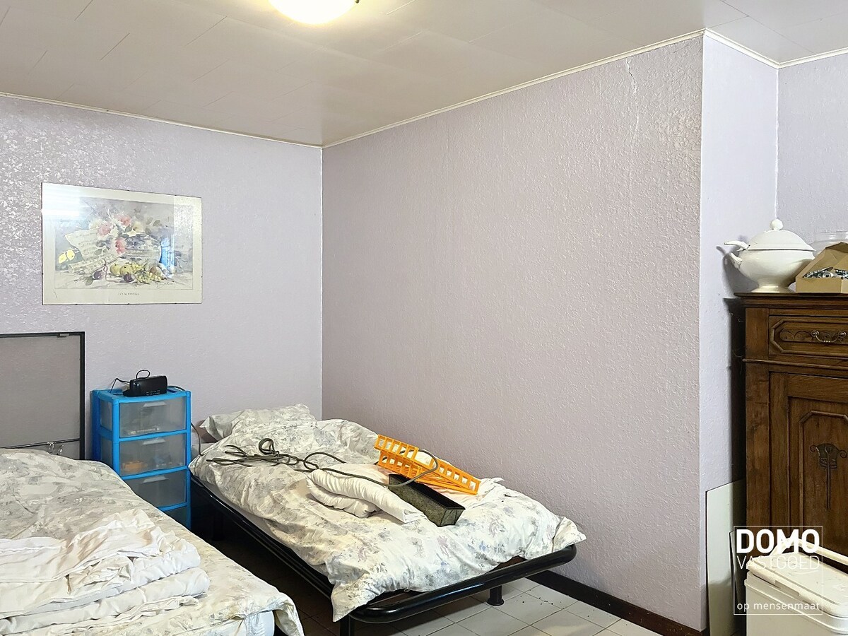Halfopen bebouwing met tuin te Herk-de-Stad 