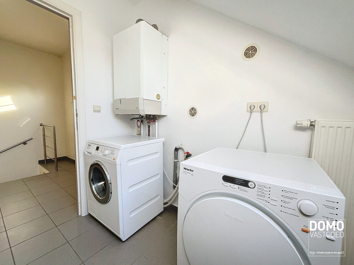 RUIM APPARTEMENT MET 3 SLAAPKAMERS EN GARAGE TE TUILT 