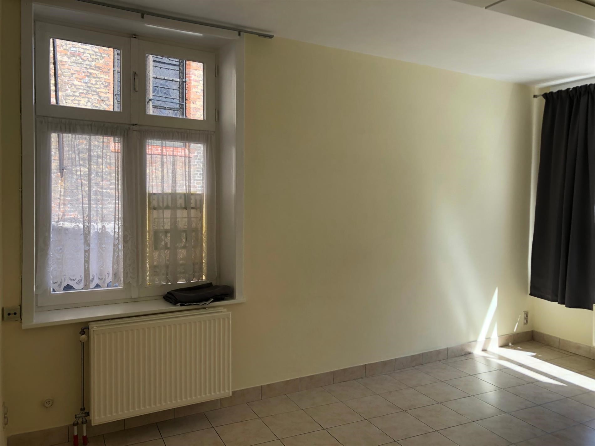 Gelijkvloers appartement met 1 slaapkamer 