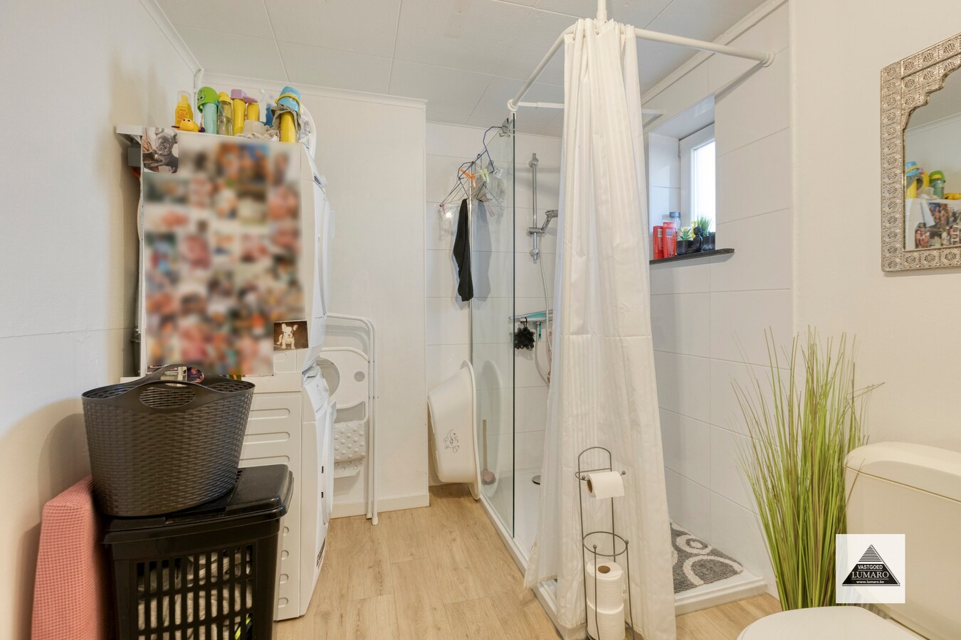 Gelijkvloers appartement met tuintje en parking 