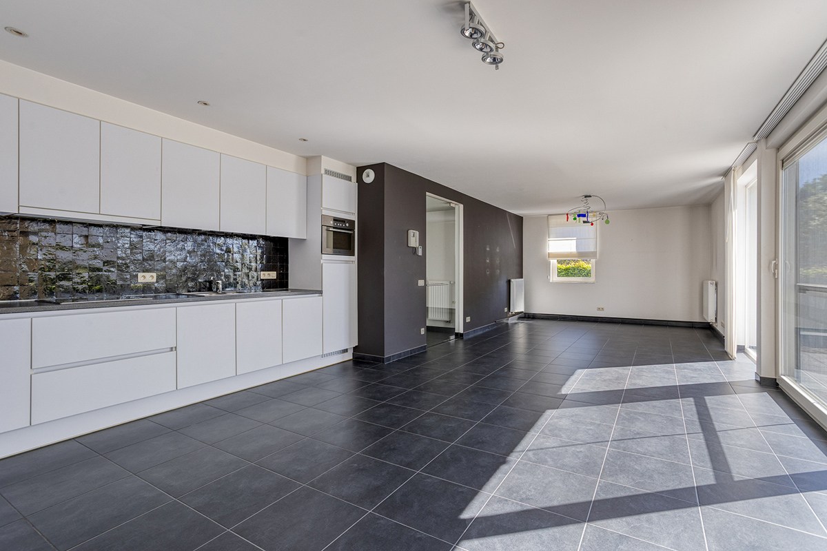Instapklaar gelijkvloers appartement met groot terras, tuin en garagebox in Kumtich - EPC 104 KWH/m² 