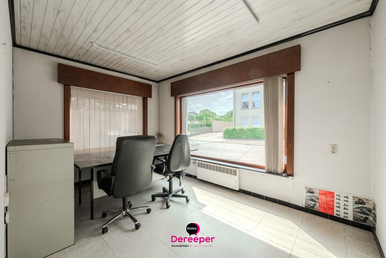 Karaktervolle woning met ruime bijgebouwen, showroom en atelier op een perceel van 2.084 m² 