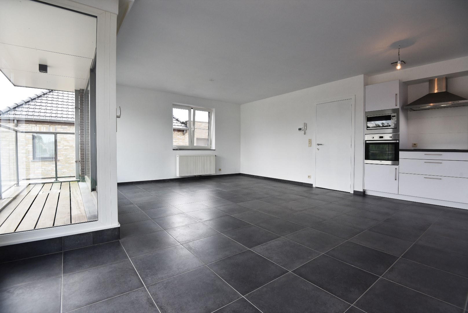 Centraal gelegen app met 1 slk, 2 terrassen en autostaanplaats te ADEGEM . 