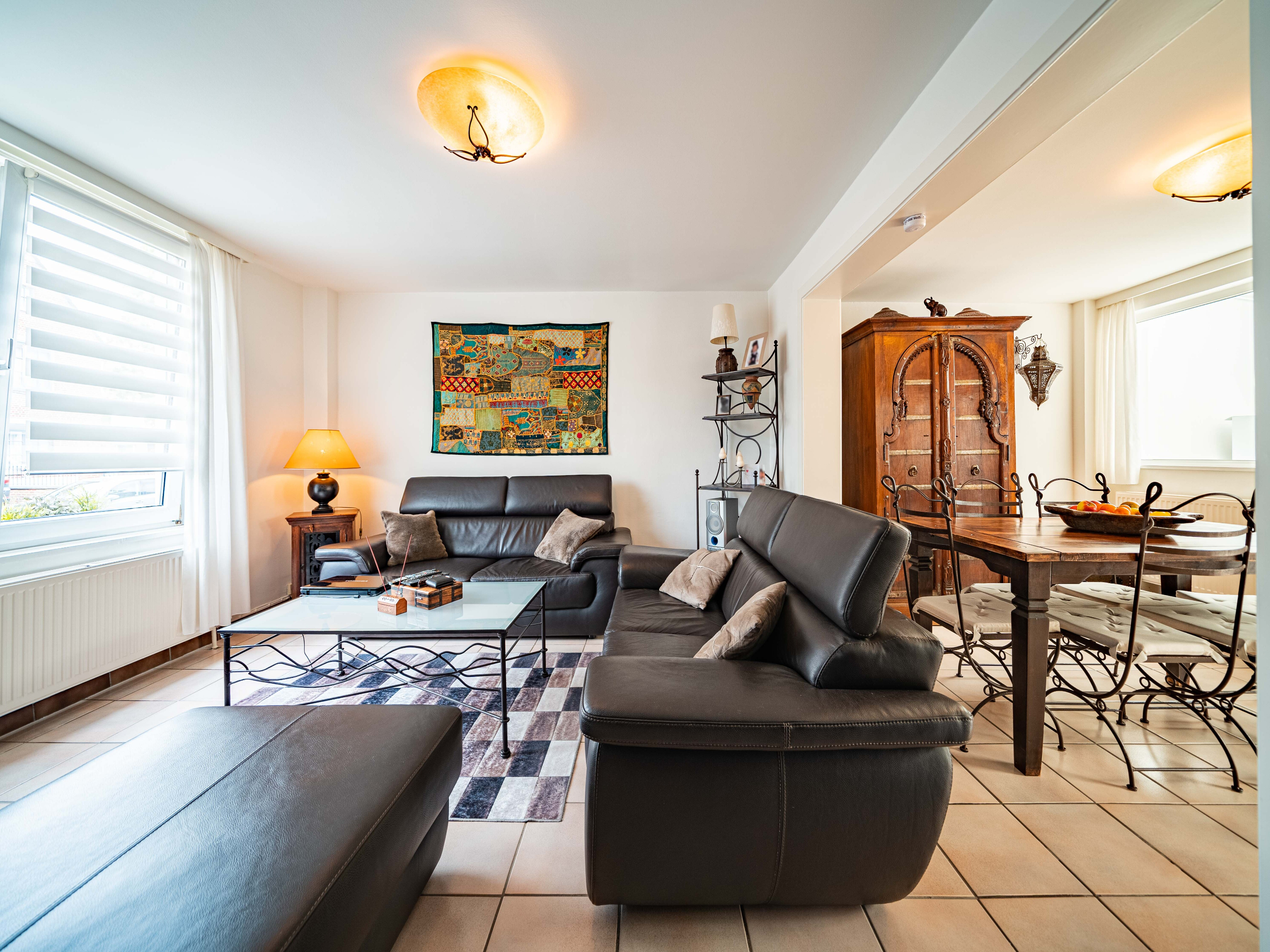 Uitzonderlijk goed onderhouden instapklare woning met 3 slaapkamers en tuin 