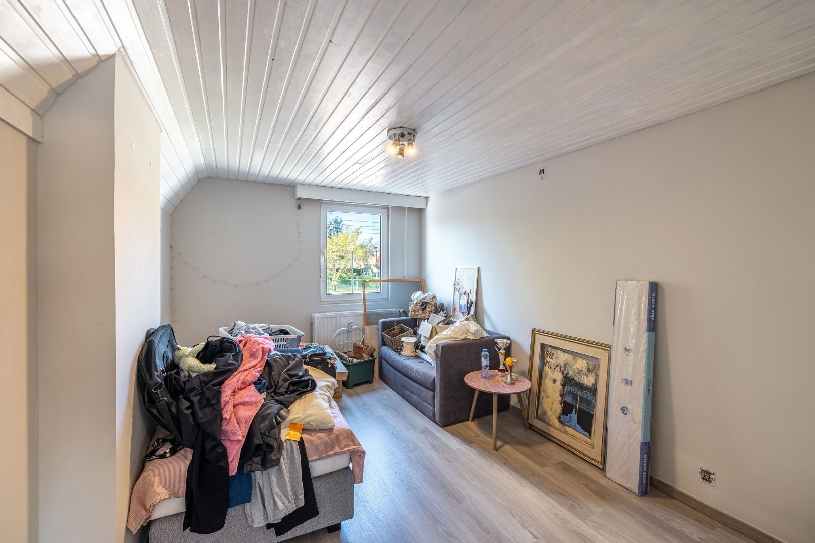 Authentieke woning met zonnige tuin, garage en bouwgrond 