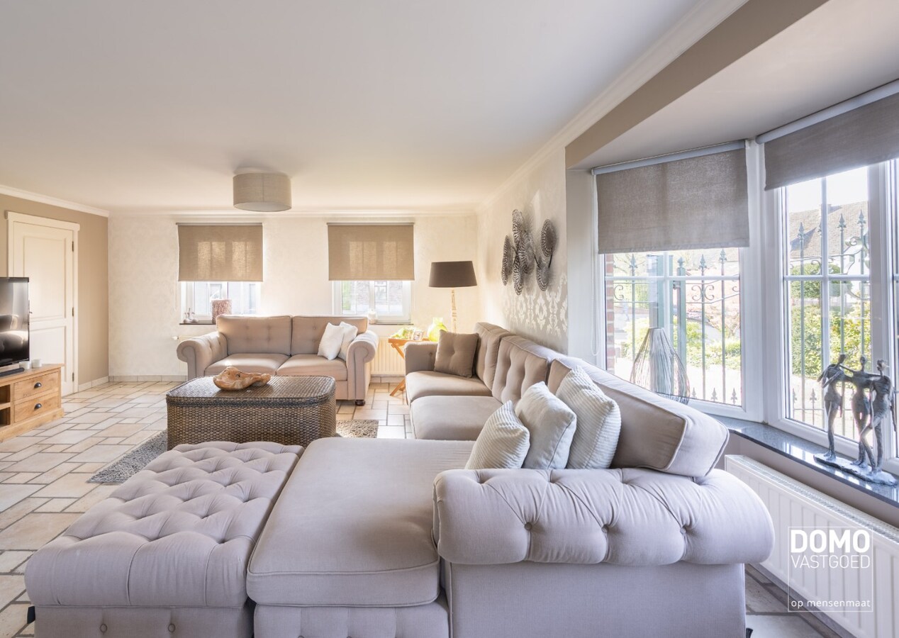 Karaktervolle en ruime gezinswoning in pastorij-/fermettestijl met prachtige tuin en 4 slaapkamers in het groene Kortessem 