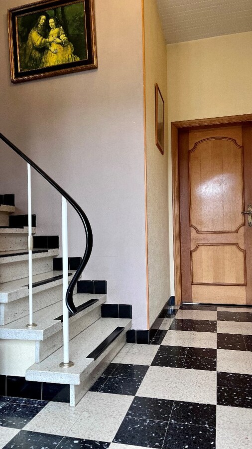 Goed onderhouden woning met tuin, terras en inpandige garage in Kermt - Energielabel E 