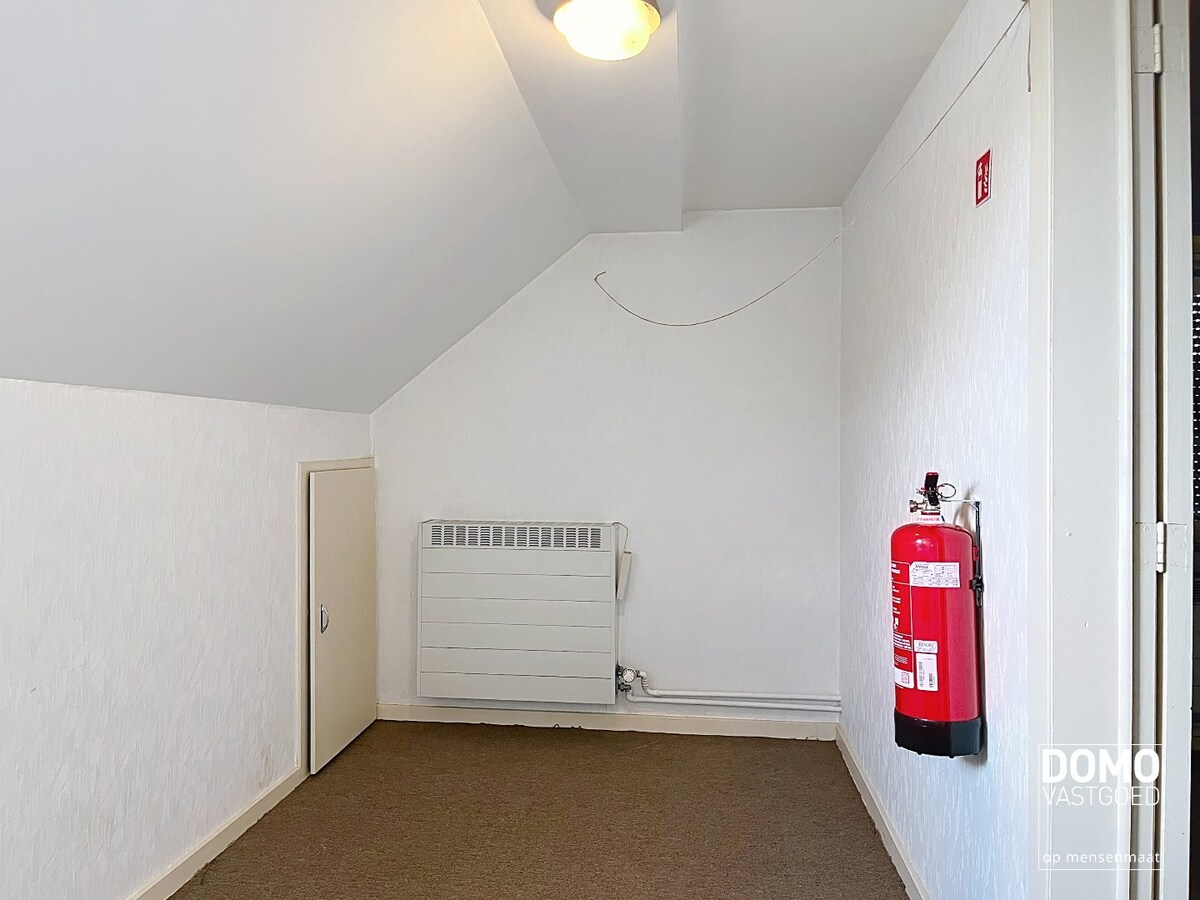 Gerenoveerde open bebouwing met tuin gelegen te Hasselt 