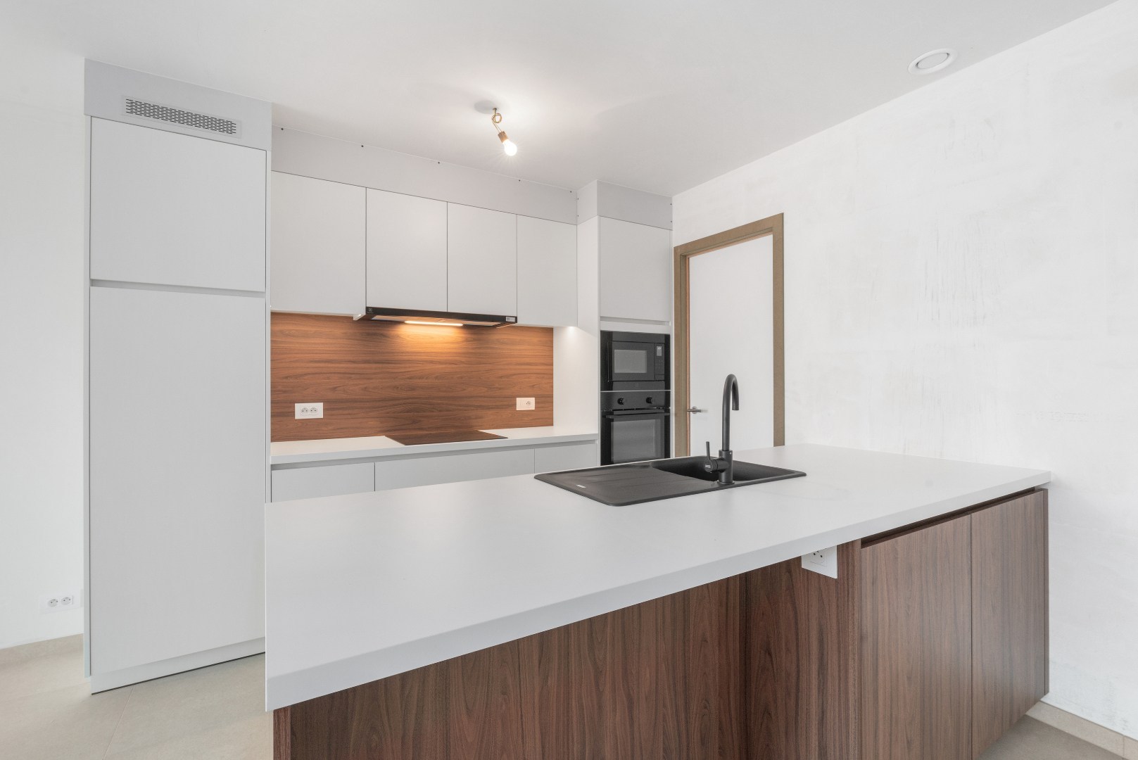 Nieuwbouwappartement met één slaapkamer, terras en ondergrondse autostaanplaats te koop in Zulte 