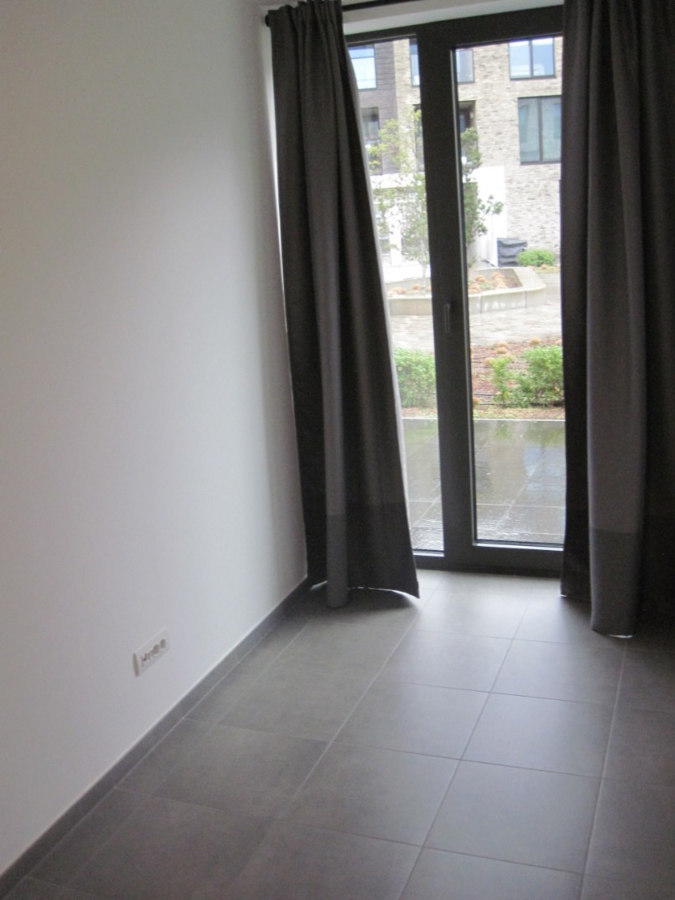 Gelijkvloers 2-slaapkamer appartement met uitzonderlijk terras. 