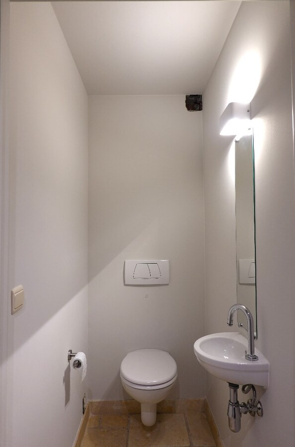 Gerenoveerde stadswoning op uitstekende ligging met binnentuin en garagebox 