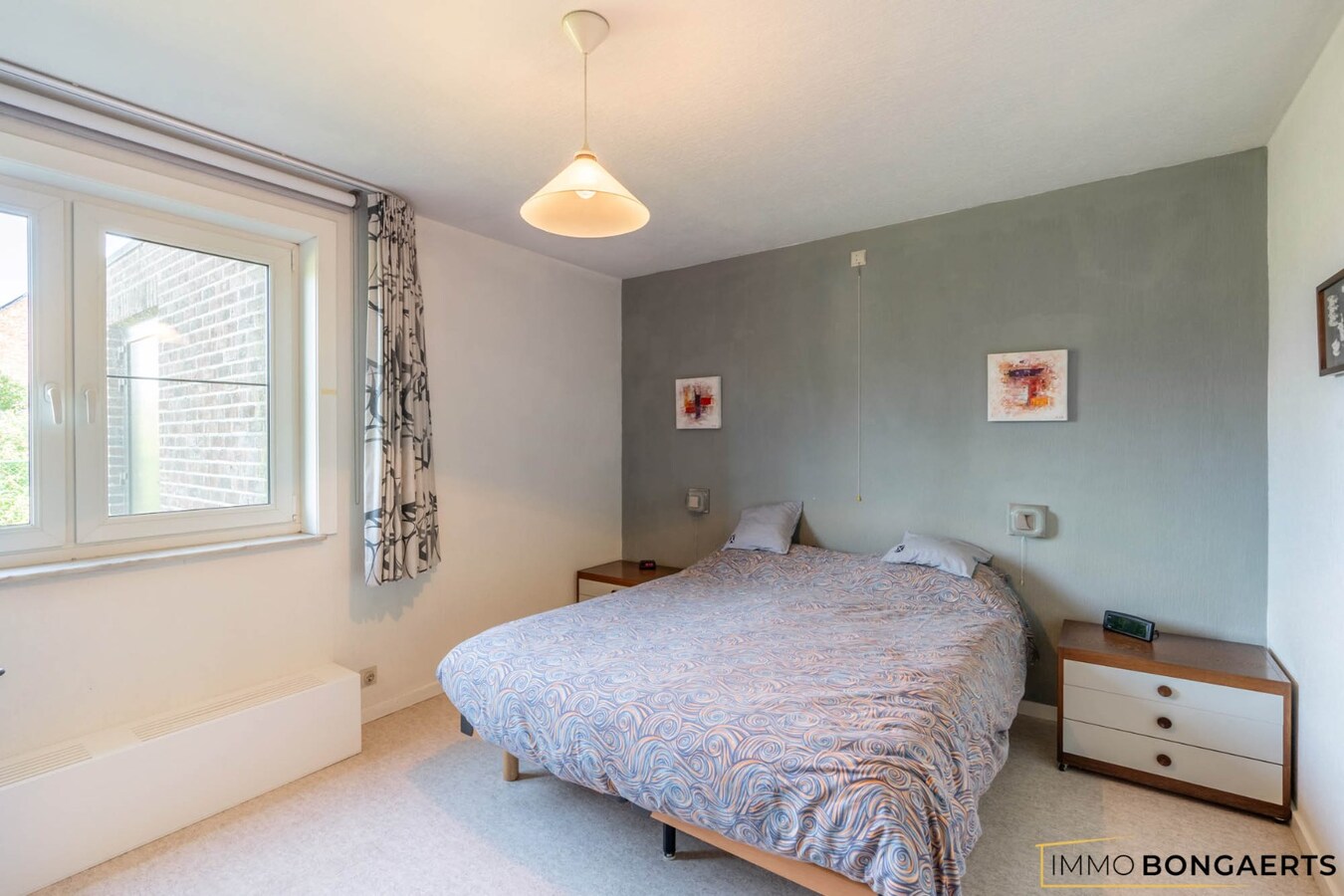 Ruime woning met 4 slaapkamers, tuin en garage in Opglabbeek. 