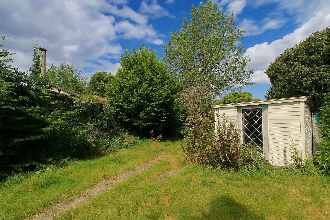 Te koop: Te renoveren woning in het hart van Sint-Niklaas – karakter, ruimte én topligging! 