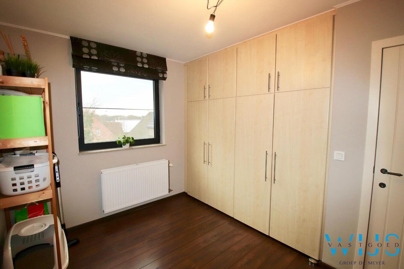 Charmant instapklaar tweeslaapkamer appartement in centrum Ertvelde! 