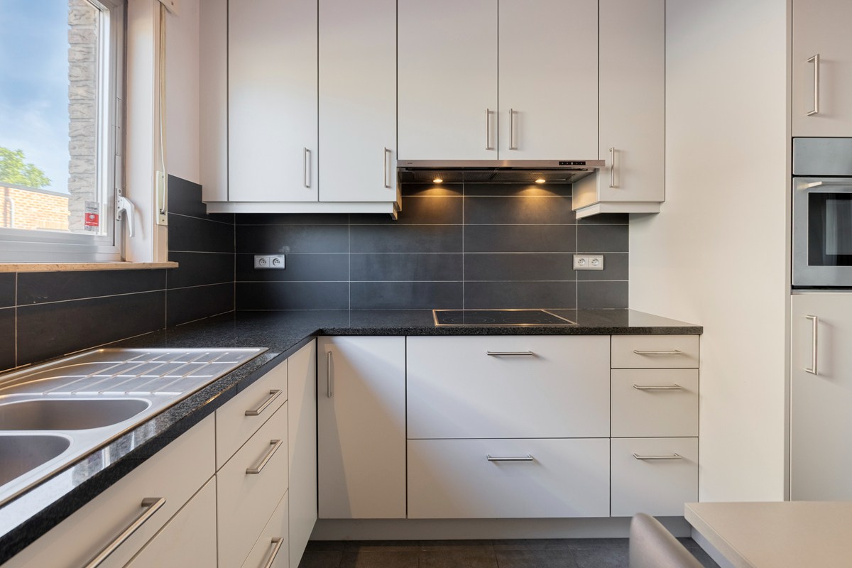 Gelijkvloers appartement met 2 slaapkamers, terras en tuin 