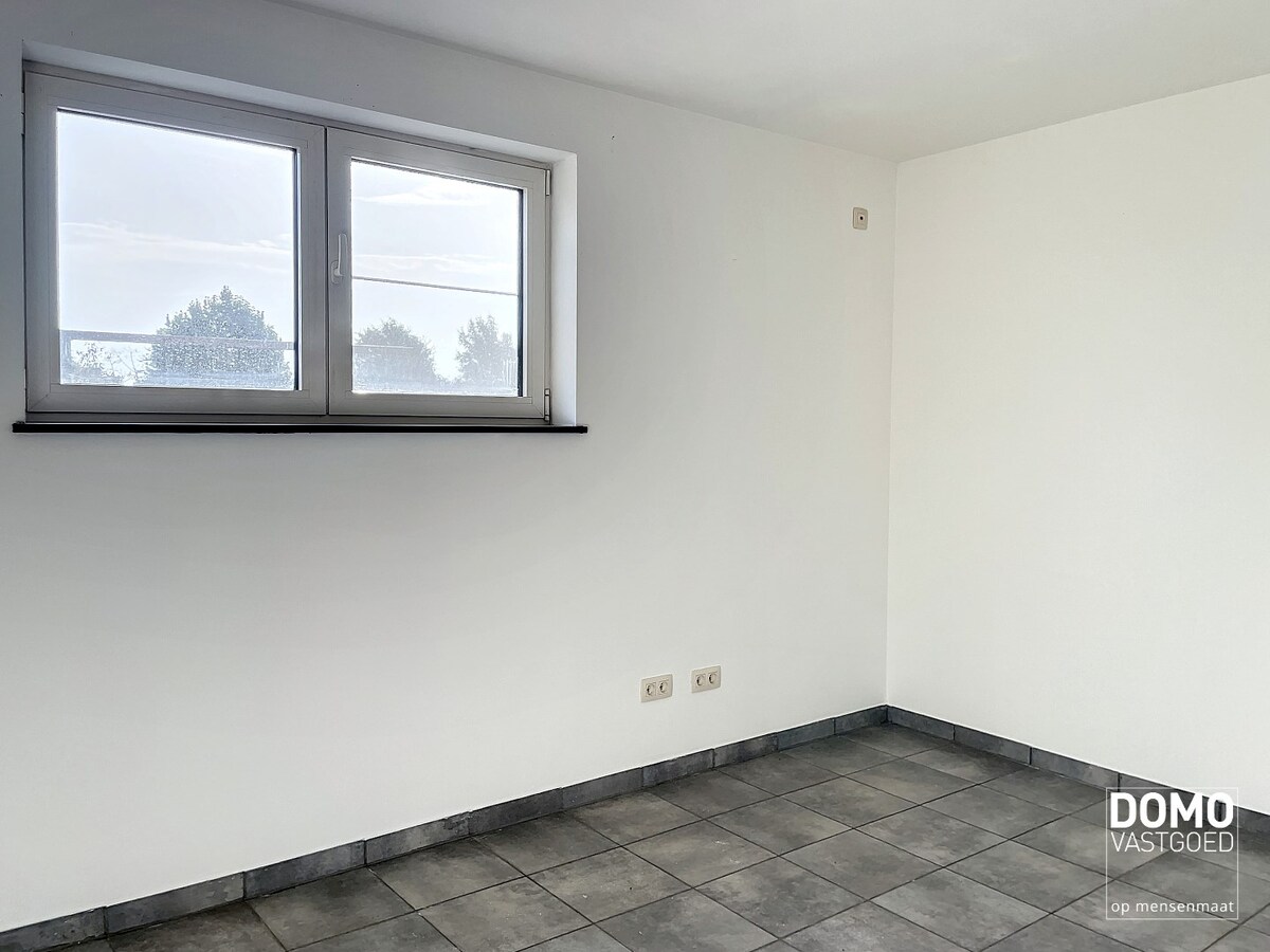 Ruim duplex appartement in Herk-de-Stad, 3 slaapkamers en tuin 