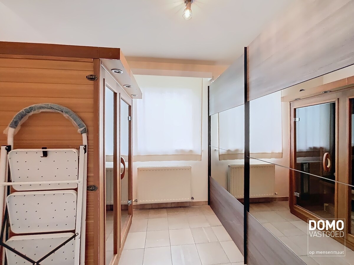 GELIJKVLOERS APPARTEMENT MET TUIN EN GARAGEBOX GELEGEN TE TUILT  (KURINGEN) 