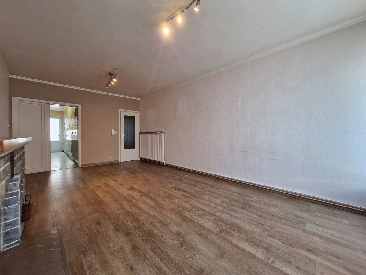 Charmant gelijkvloers appartement met stadskoer in hartje Heist 