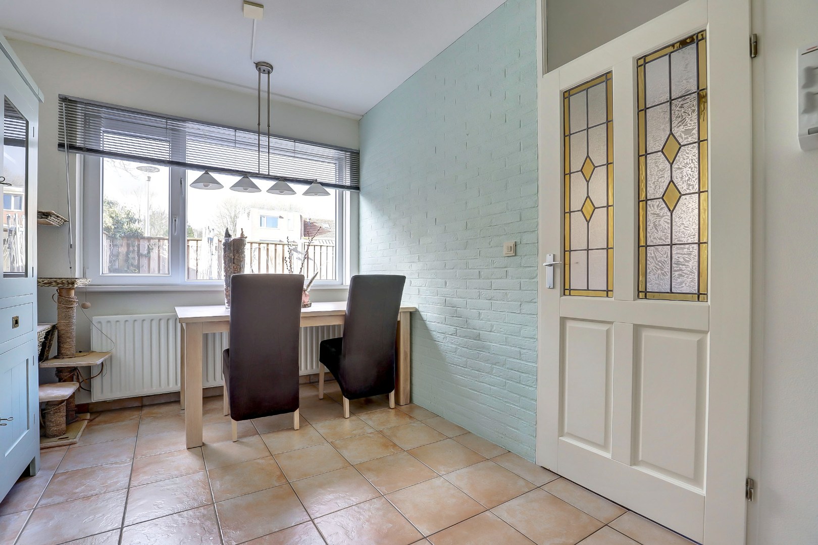 2-kamer hoekwoning met  ruime slaapkamer met airconditioning, tuin op het zonnige zuidwesten. 