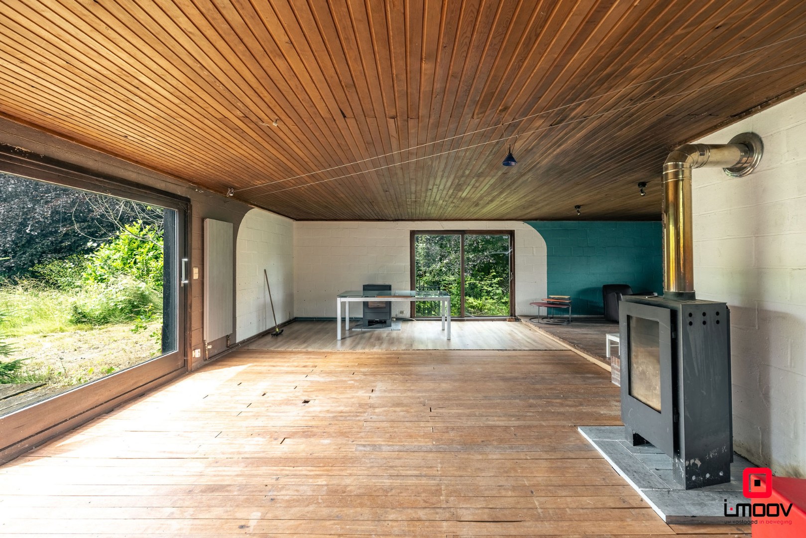 Seventies bungalowvilla met renovatiepotentieel op unieke ligging aan natuurgebied 
