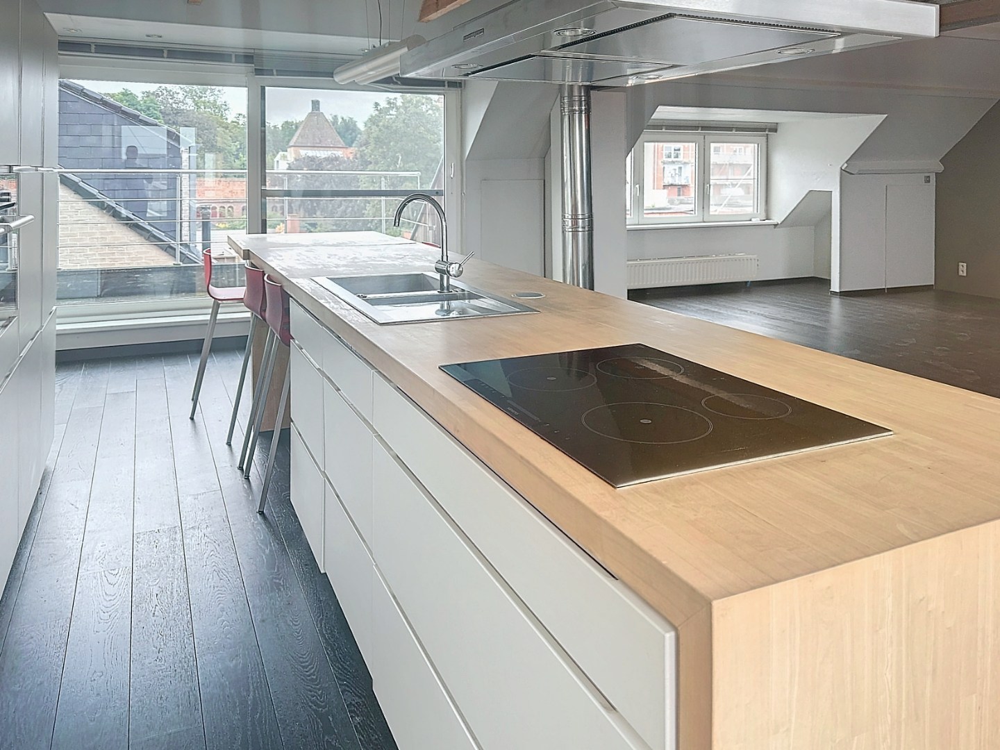 Opbrengsteigendom bestaande uit 3 appartementen + handelsgelijkvloers gelegen in het centrum 