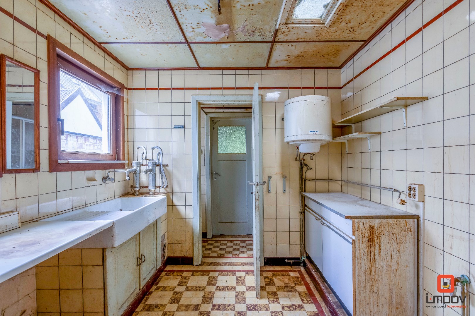 Karaktervolle te renoveren woning in Sint-Amandsberg 