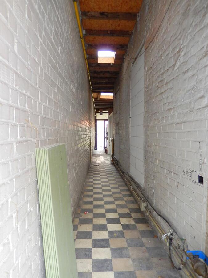 Op te frissen woning met tuin in hartje van Brugge! 