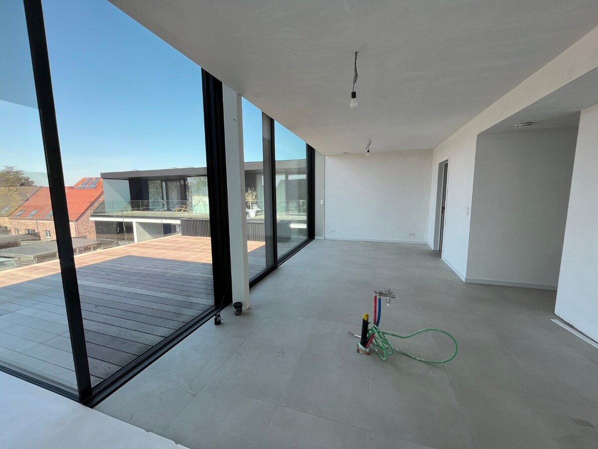 Luxe penthouse in hartje Zingem 