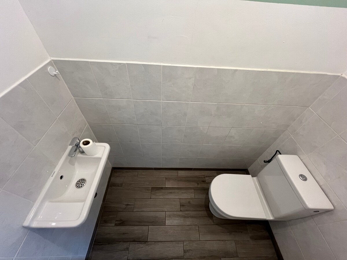 Centrumwoning met tuin, terras én ondergrondse parkeerplaats. 