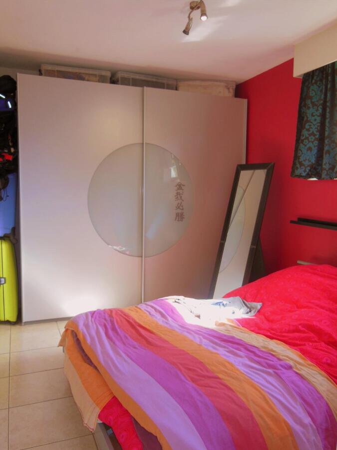 Gezellig gelijkvloersappartement met zonnige tuin en garage 