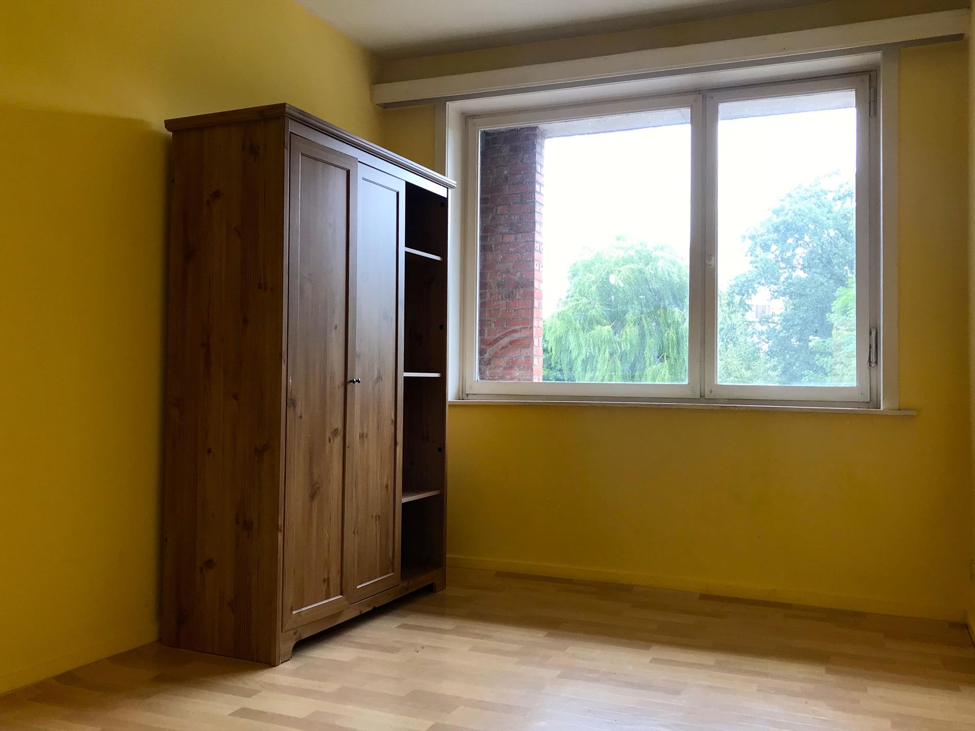 Op te frissen appartement op enkele minuten van markt 