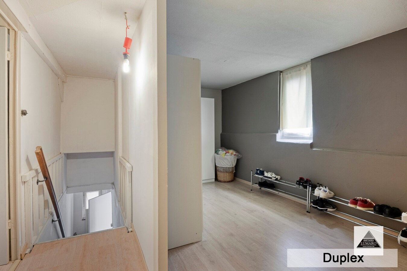 Dilsen-centrum - opbrengstpand: winkel + 2 appartementen 