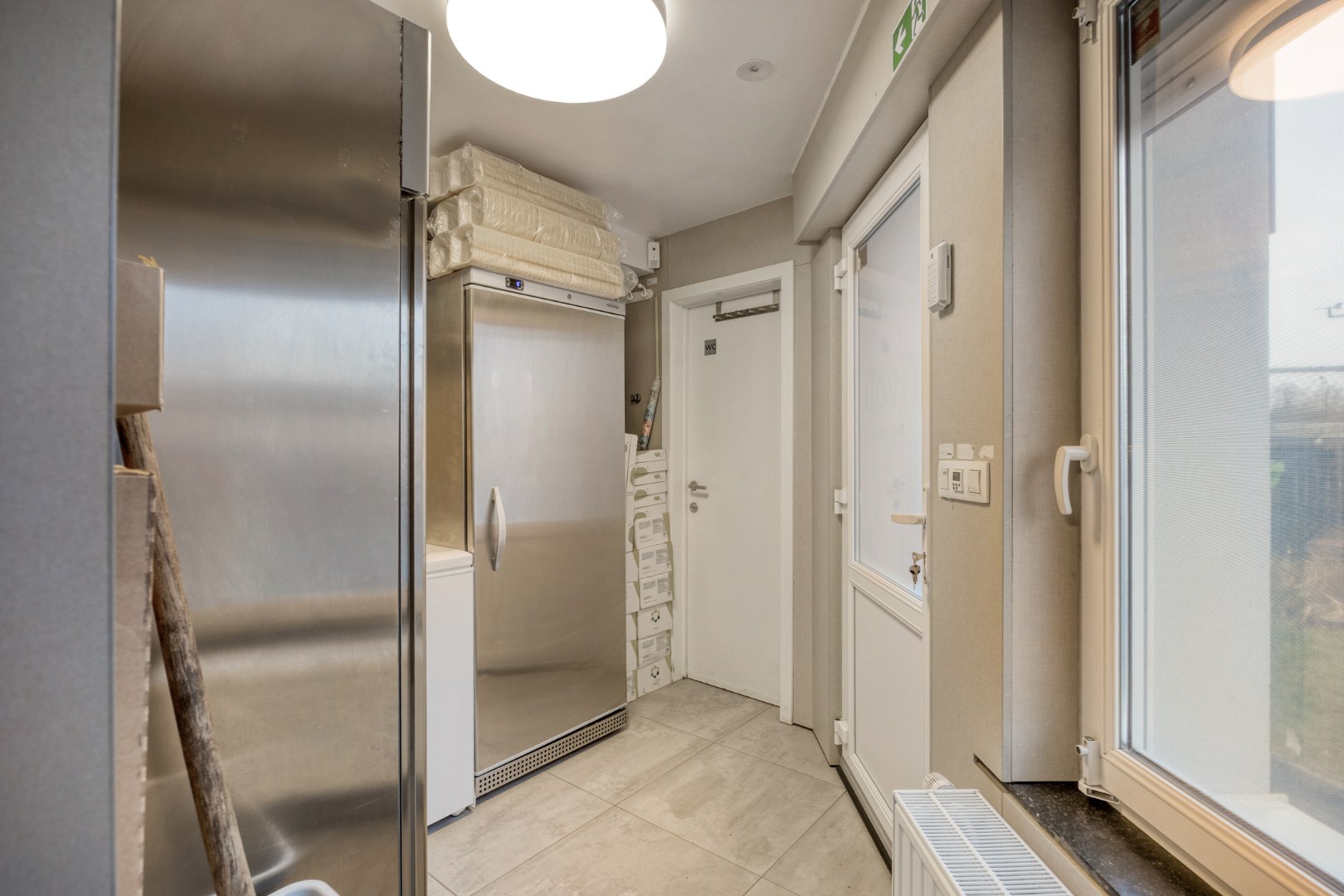 Opbrengsteigendom met handelspand en 3 appartementen te koop in Heverlee op een super ligging! 