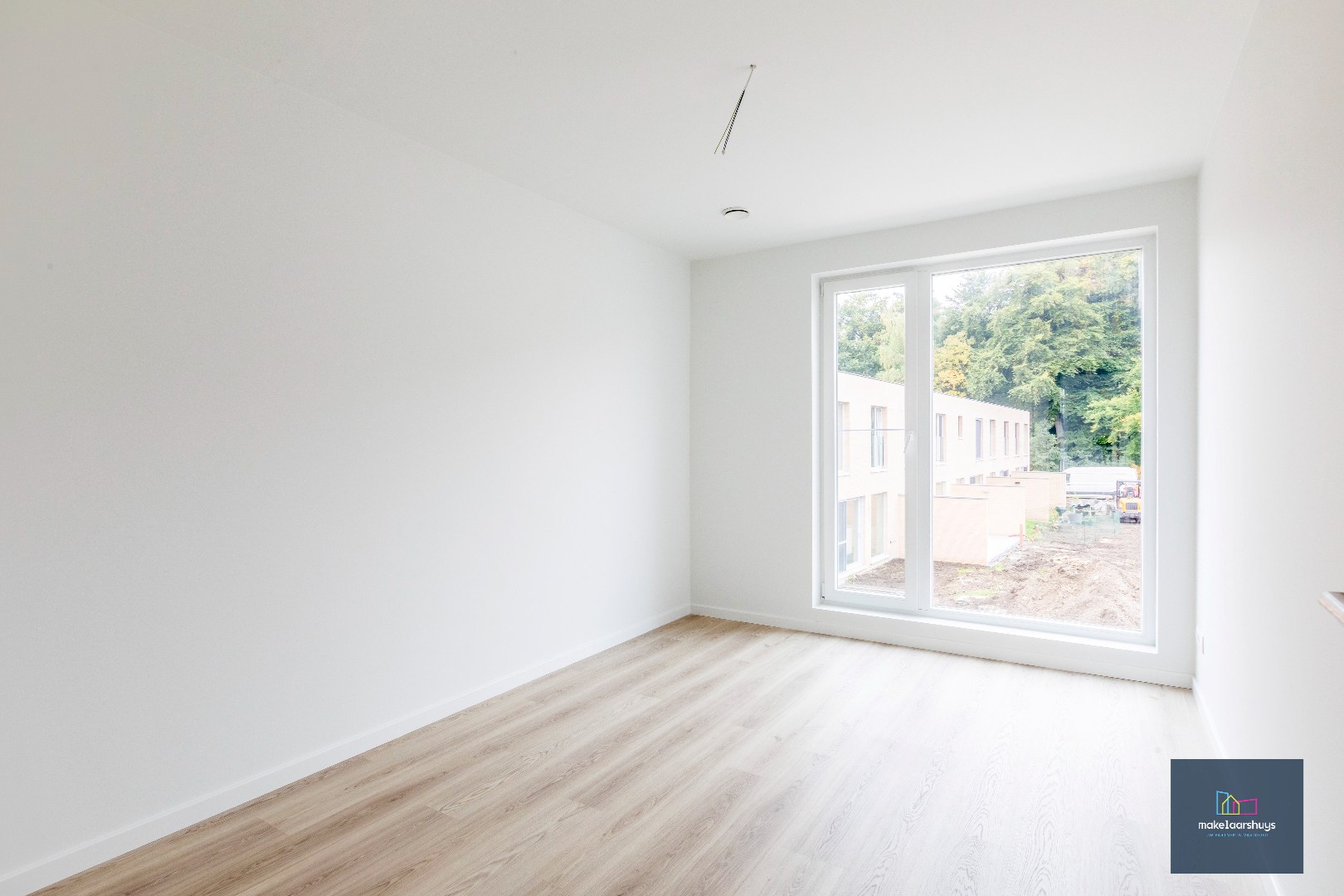 Energiezuinige nieuwbouwwoning met 3 slaapkamers , tuin en staanplaats 