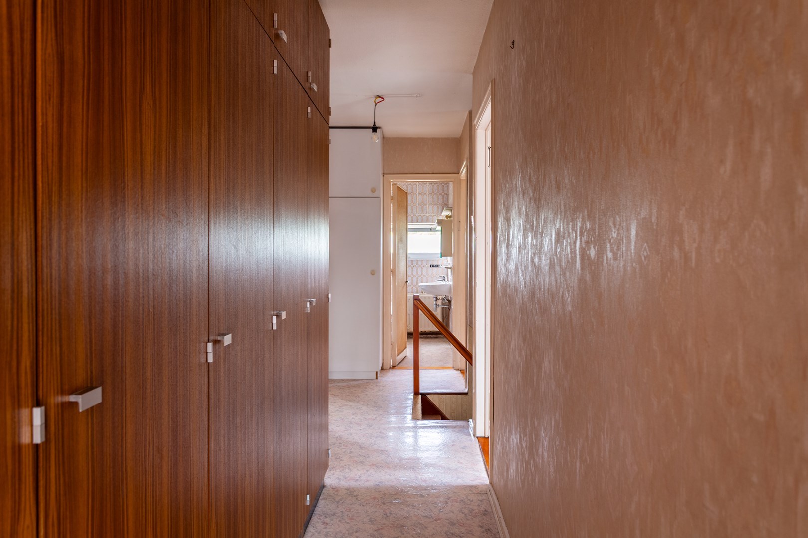 Halfopen gezinswoning met grote tuin en garage 