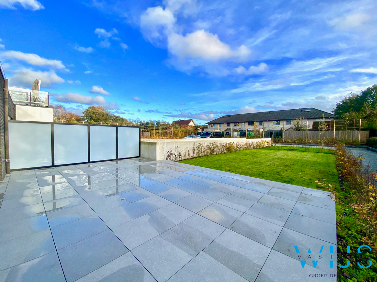 Zeer aangenaam gelijkvloers appartement met tuin te Belzele ! 