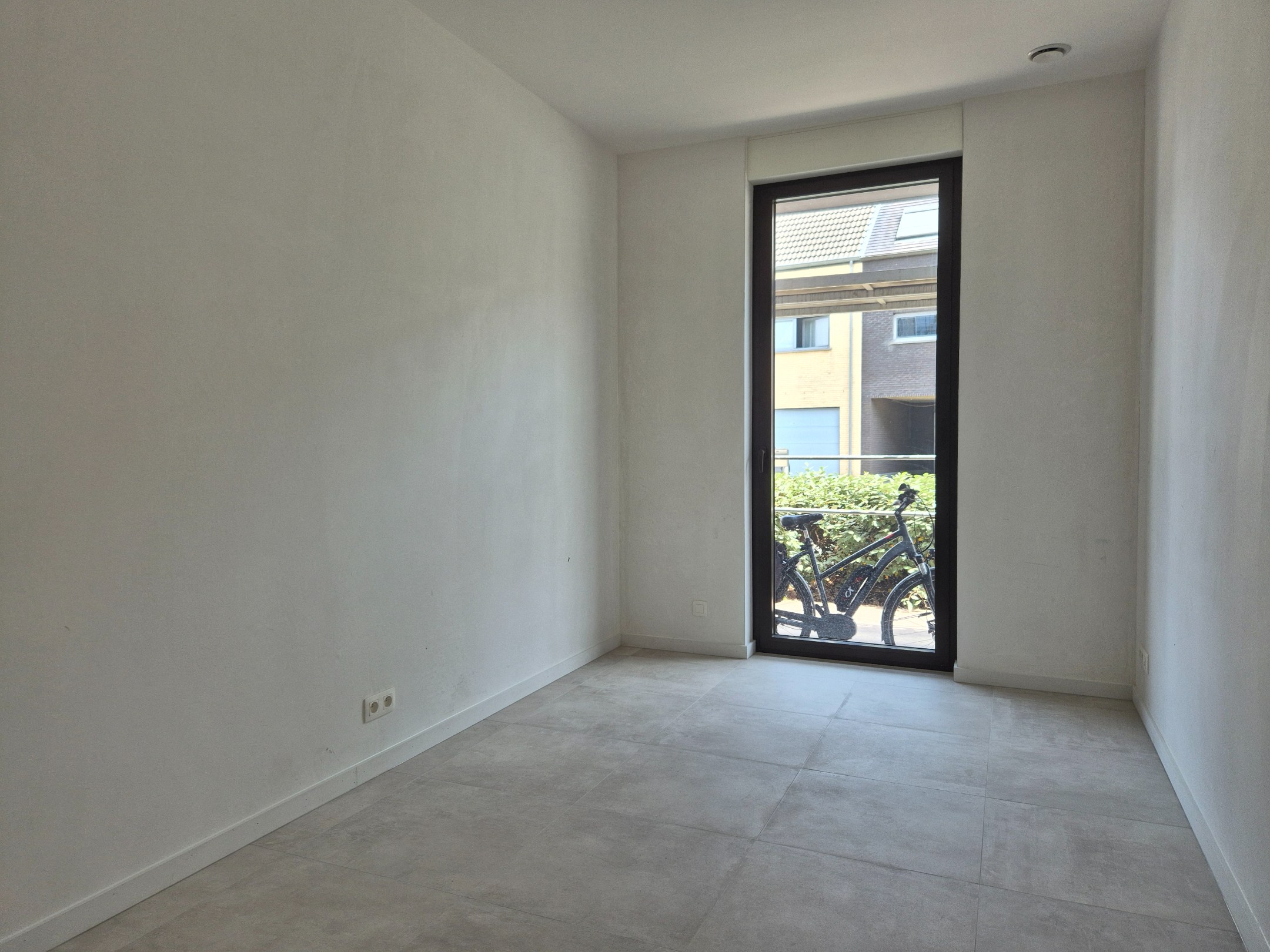 Gelijkvloers appartement met 2 slaapkamers, tuin en terras 