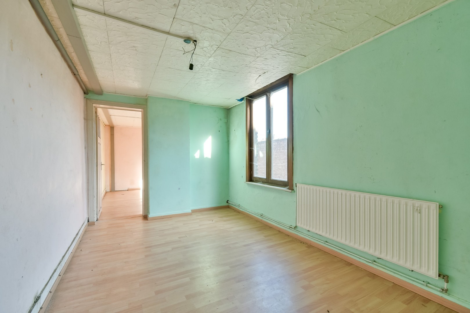 Te renoveren woningen met bijhorende loods! 