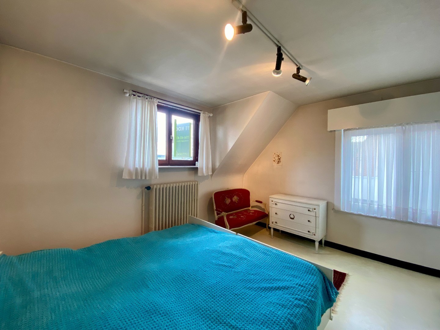 Degelijke te renoveren halfopen woning met tuin en garage op 293 m²! 