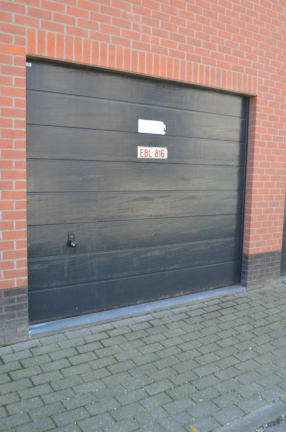 Gelijkvloers app met 1 slpk en garage te centrum Eeklo 