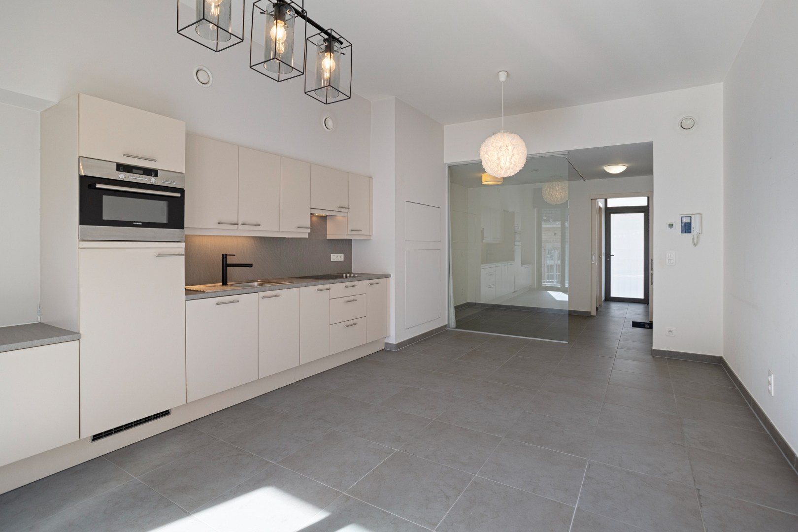 Studio met ruim terras, ondergrondse autostaanplaats en private kelderberging in Leuven! - EPC 60 kWh/m² - bewoonbare opp. 47 m² 