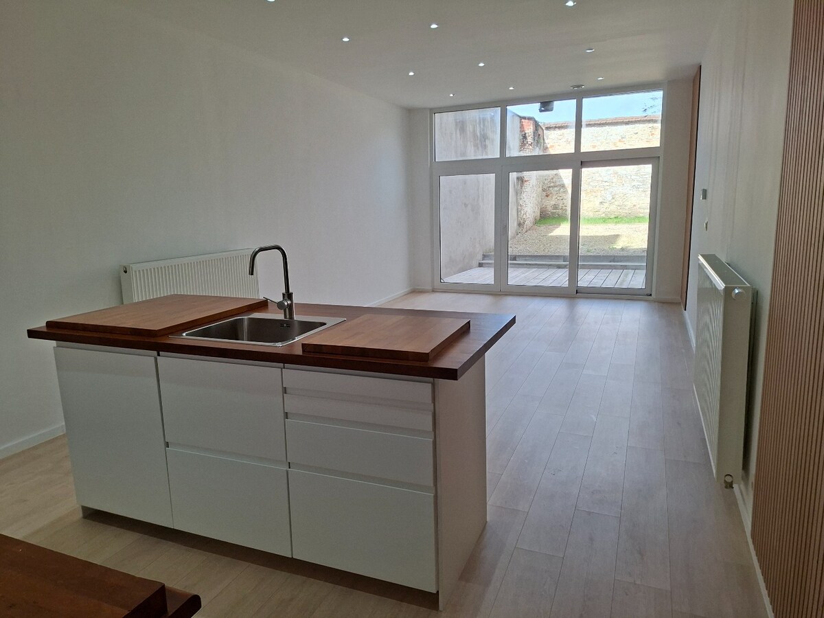 Rarissime; appartement état neuf avec jardin. 