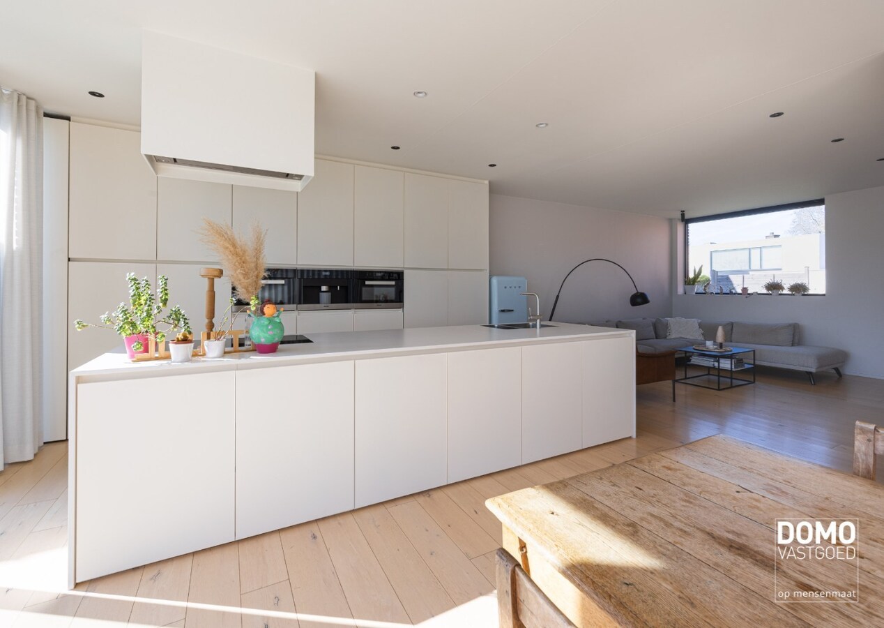 Instapklare moderne gezinswoning met zuidgerichte tuin en knappe afwerking in Hasselt 