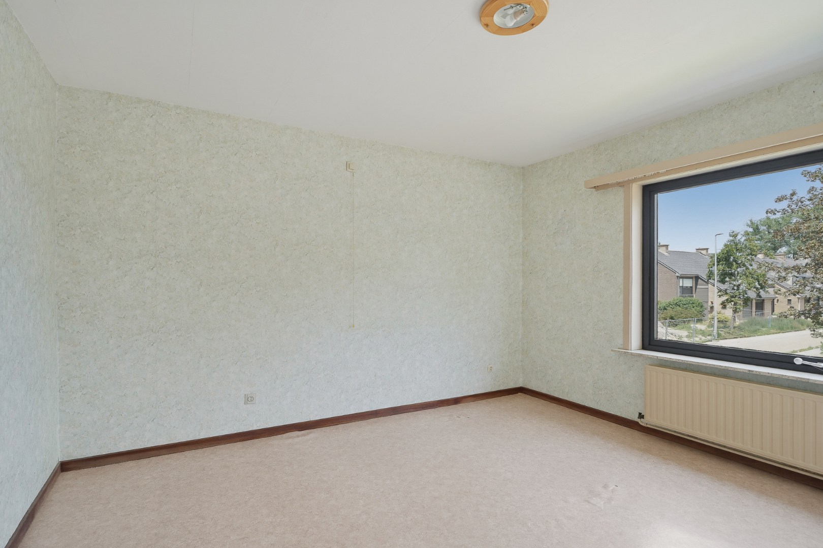 Renovatiewoning met 3 slpks, garage en zonnige tuin 